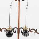 dangling gold champagne and black acrylic ball earrings
