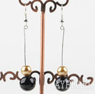 dangling gold and black acrylic ball earrings