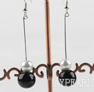 dangling white and black acrylic ball earrings