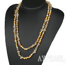 ブルーレザーとシンプルなデザインの白とグレーのFW真珠のネックレス