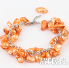 irregular shape dyed orange pearl bracelet with extendable chain