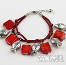 red colored glaze and fish charm bracelet with extendable chain