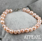 7.5 inches 6-7mm fresh water pink pearl beaded bracelet with lobster clasp