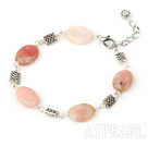 7.5 inches oval pink opal bracelet with lobster clasp