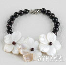 elegant sort perle og hvitt skall blomst armbånd med hummer låsen