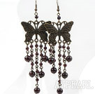 Vintage style Accessoires Garnet et papillon Boucles d'oreilles