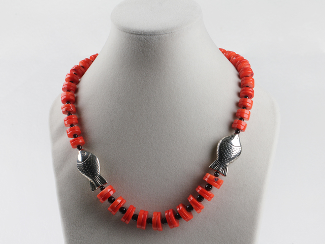 single strand disk shape coral and garnet necklace