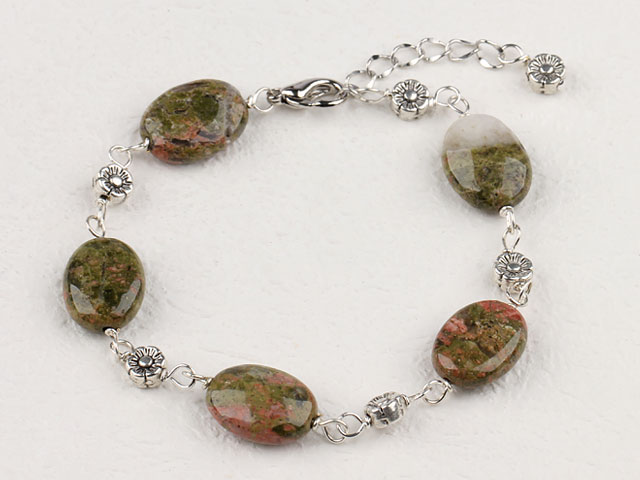 green piebald stone bracelet with lobster clasp