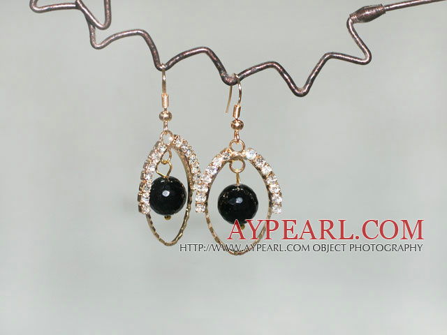 trendy big loop earrings with black stone in center 
