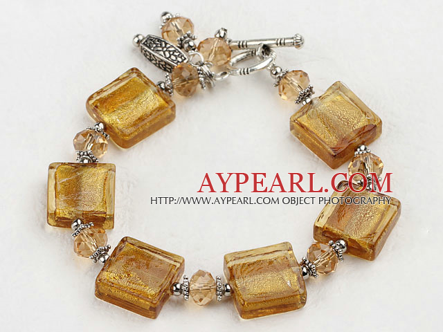 yellow crystal and colored glaze bracelet with toggle clasp