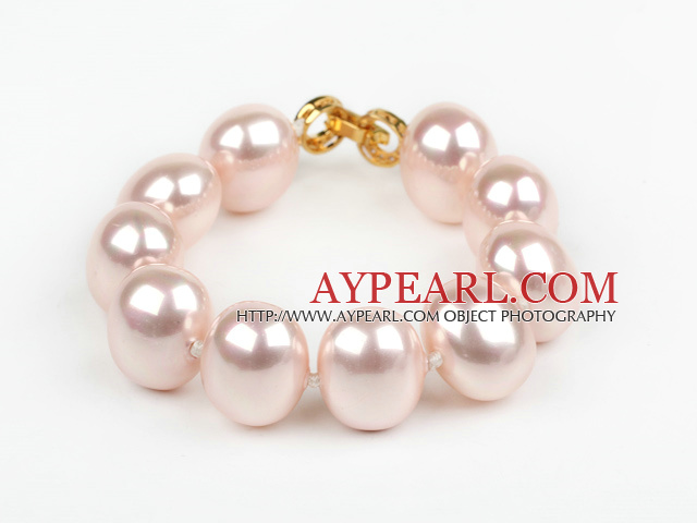 high quality egg shape pink color sea shell beads bracelet with gold plated clasp