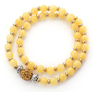 Kaksoisriviä Keltainen Jade ja kultainen väri helmiä Stretch rannerengas rannekorun kanssa Yellow tekojalokivi Ball