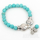 Simple Turquoise ronde perles Design Bracelet extensible avec accessoires de poissons doubles