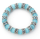 10mm Runda Ljusblå färg Cats Eye och Tibet Silver Spacer tillbehör ring Stretch Bracelet
