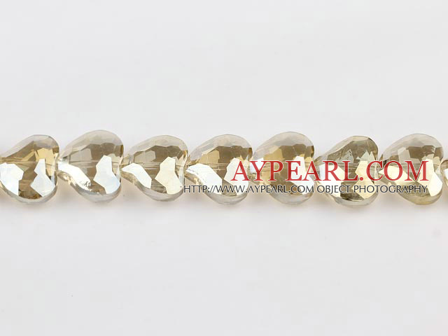 manmade crystal beads,8*15*18mm heart,accompany with the light yellow color,Sold per 14.17-inch strands