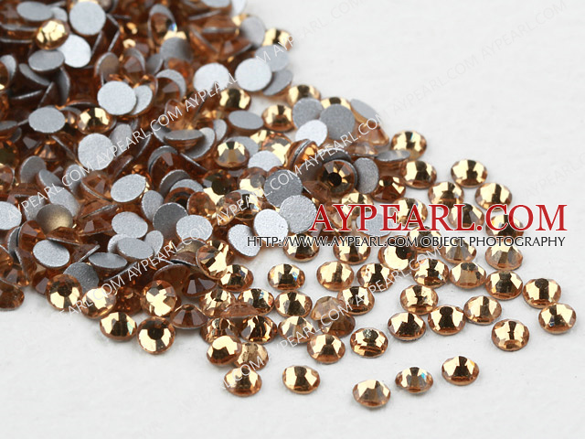 Rhinestone cabochon, crystal yellow, silver-foil back ,3.0-3.2mm faceted round, SS12. Sold per pkg of 1440.