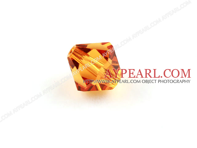 Austrain crystal beads, golden champagne color, 8mm bicone. Sold per pkg of 360.