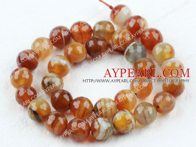 Agate gemstone beads, orange, 12mm streaked faceted round. Sold per 15.16-inch strand.